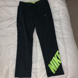 Nike therma-fit black sweatpants with neon green